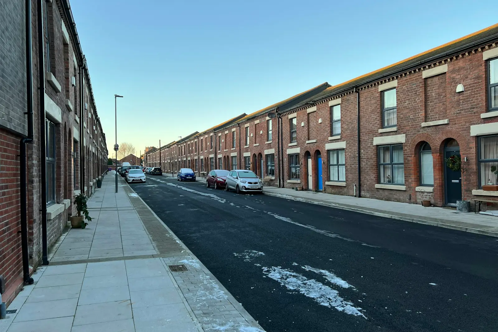 Street of red-brick terraced houses